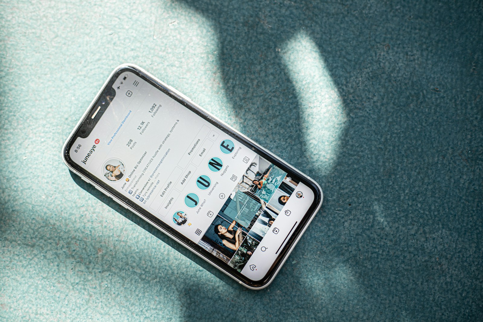 Photo by June Aye white samsung android smartphone on teal textile